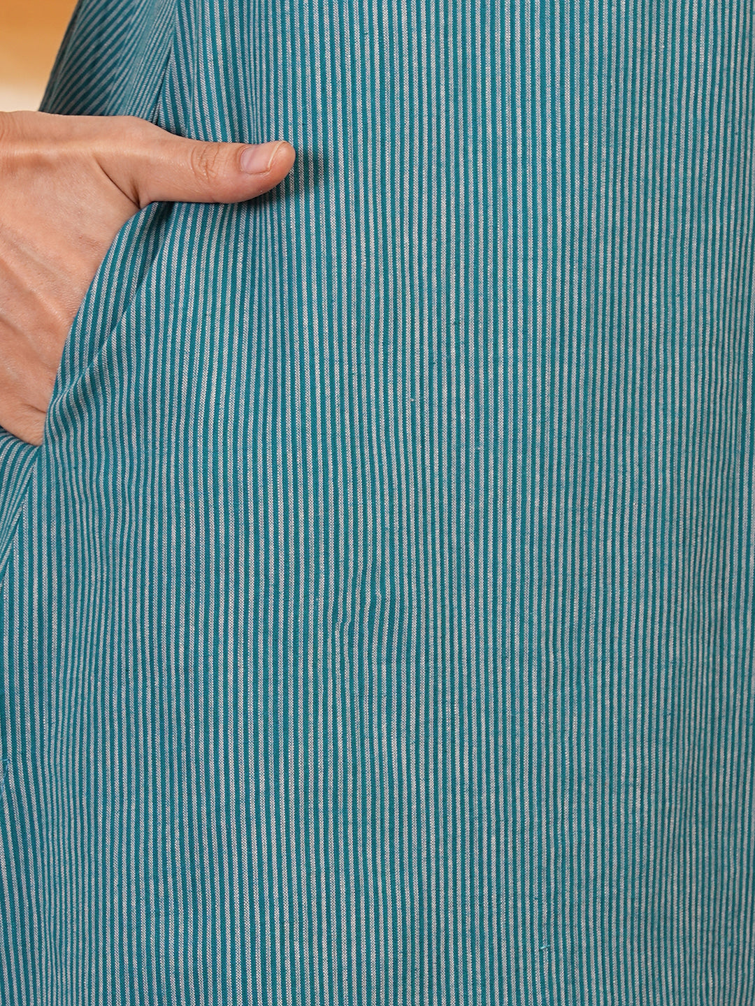 A line striped kurta with printed cotton trim,block print and hand embroidery