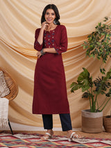 Straight Cotton flax kurta with hand embroidery and hand applique detailing.