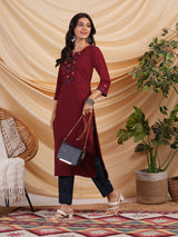 Straight Cotton flax kurta with hand embroidery and hand applique detailing.