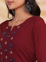 Straight Cotton flax kurta with hand embroidery and hand applique detailing.