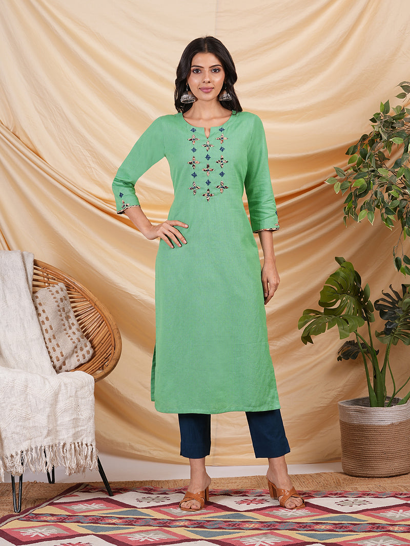 Straight Cotton flax kurta with hand embroidery and hand applique detailing.