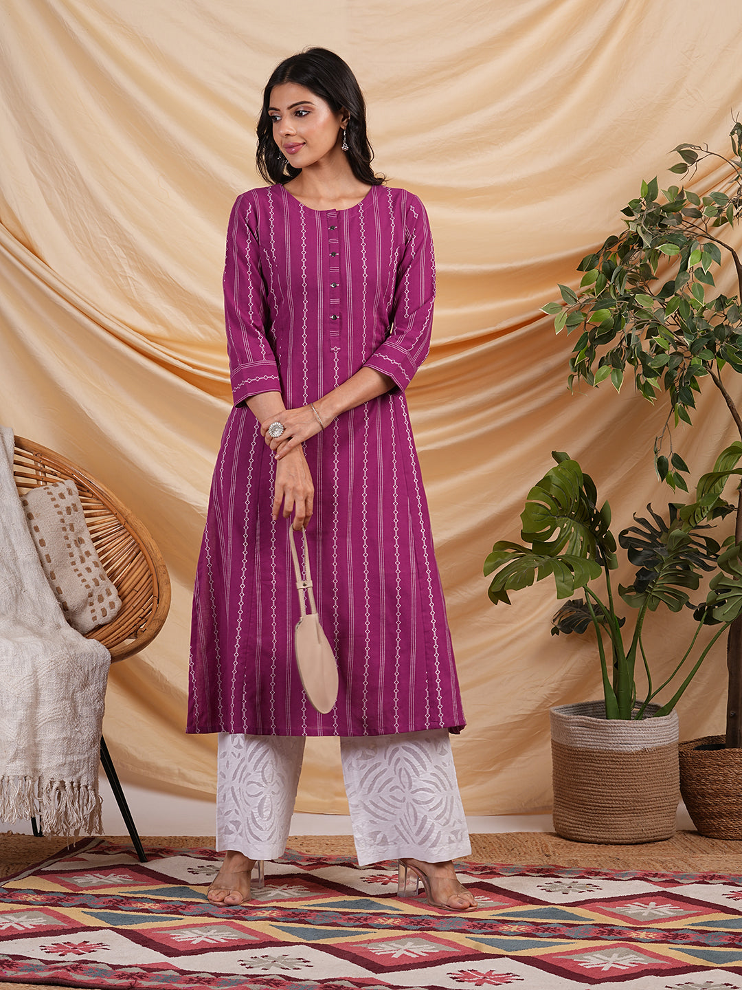 A line woven kurta with a shoulder princess line with a central placket