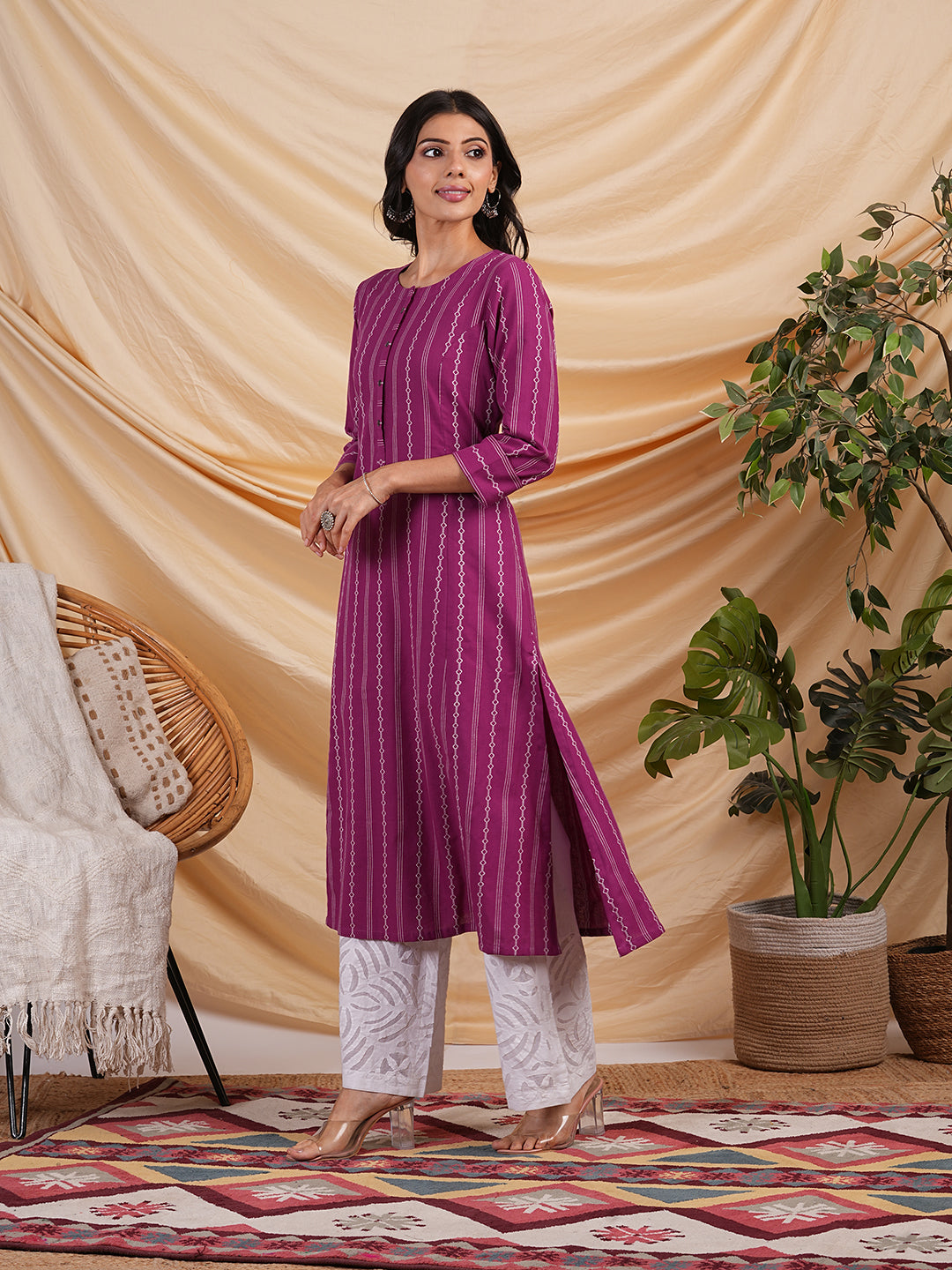 A line woven kurta with a shoulder princess line with a central placket