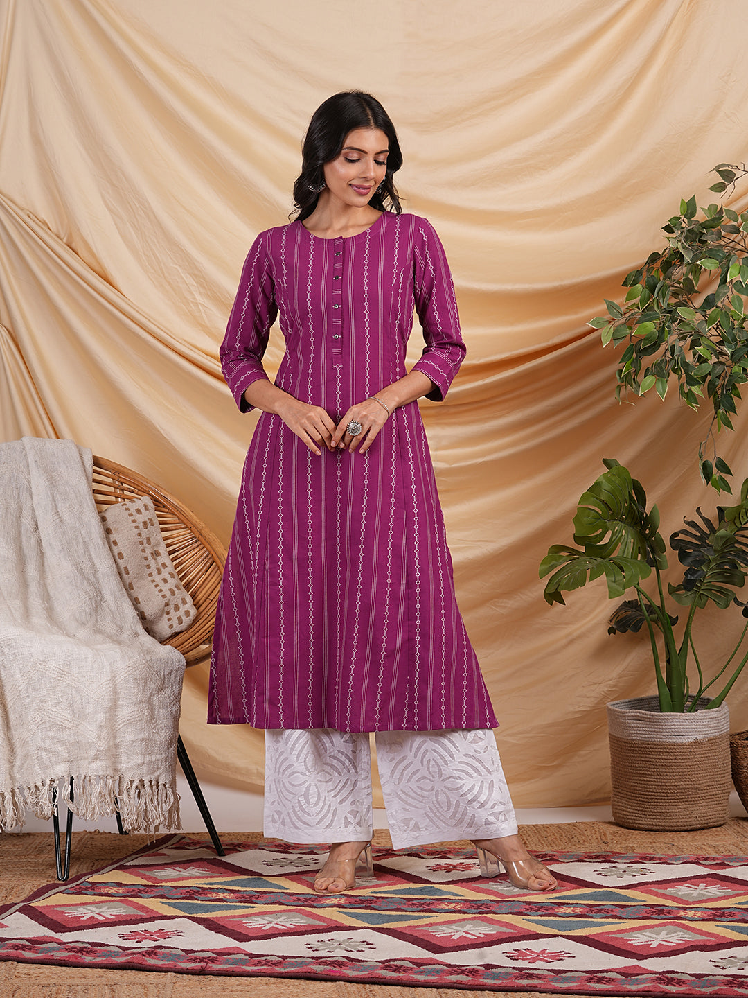 A line woven kurta with a shoulder princess line with a central placket