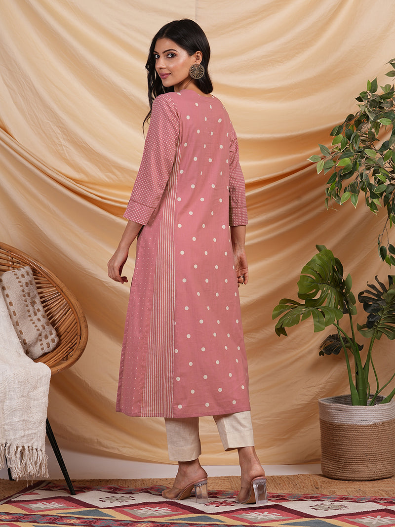 A line kurta with blend of different cotton prints & pocket.