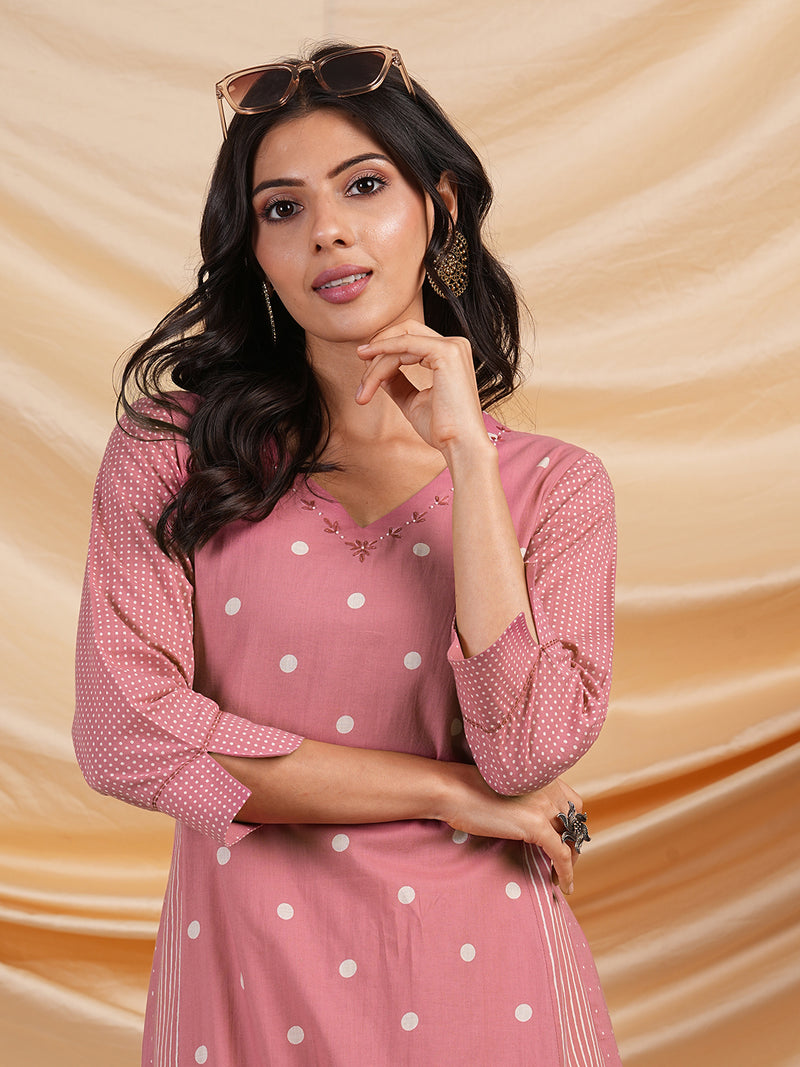 A line kurta with blend of different cotton prints & pocket.