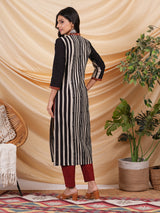 Straight cut hand block printed cotton kurta with hand embroidery.