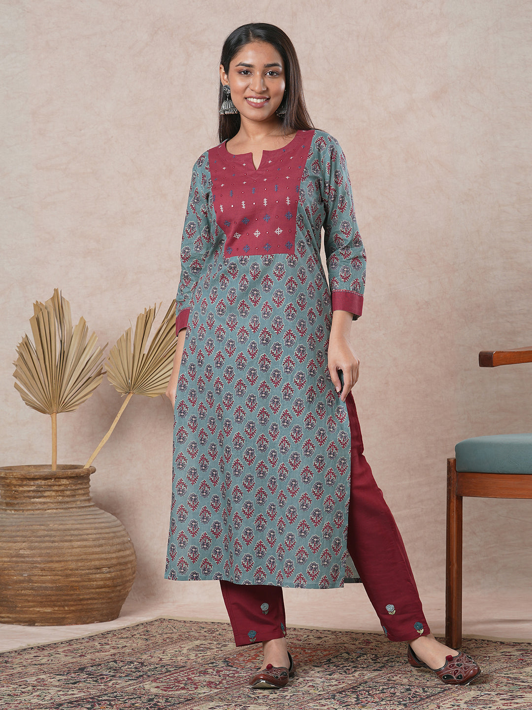Straight cut printed kurta with a hand embroidered yoke and sleeve details