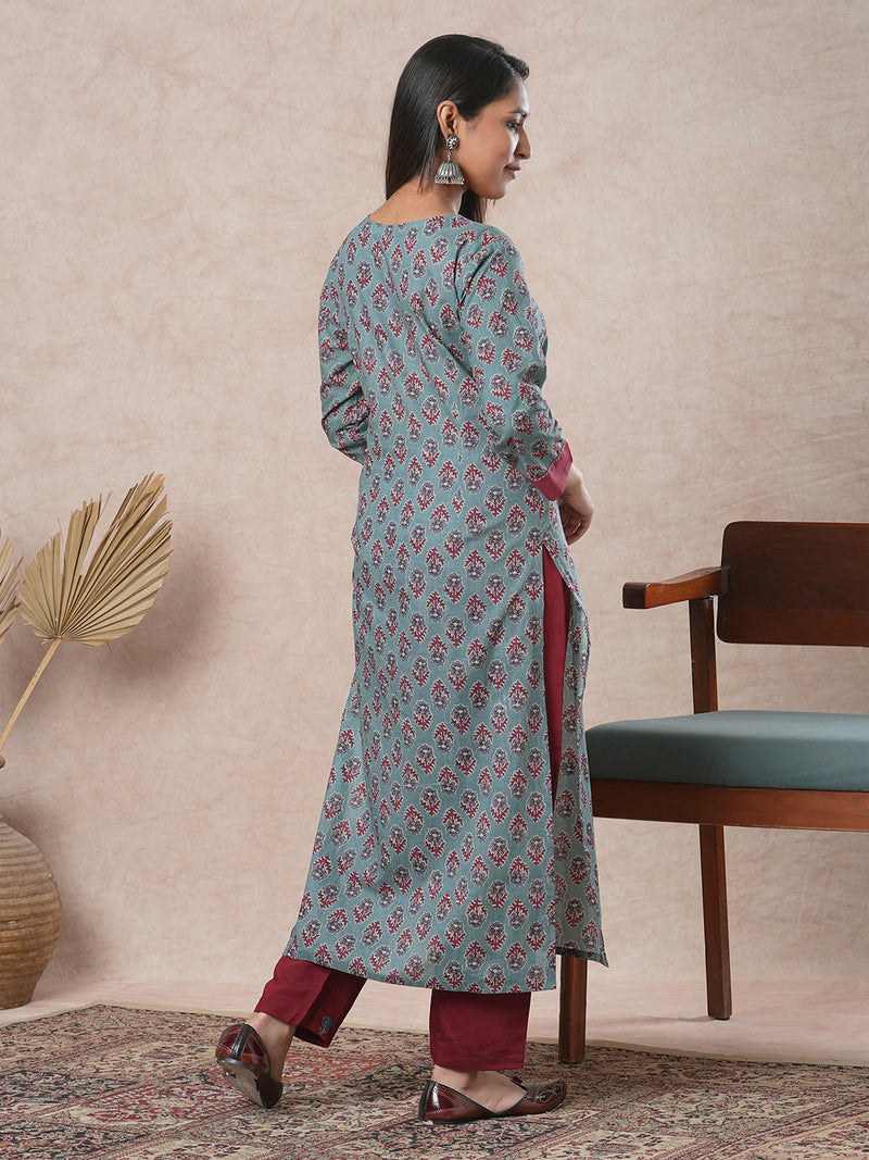 Straight cut printed kurta with a hand embroidered yoke and sleeve details.