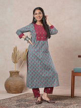 Straight cut printed kurta with a hand embroidered yoke and sleeve details.