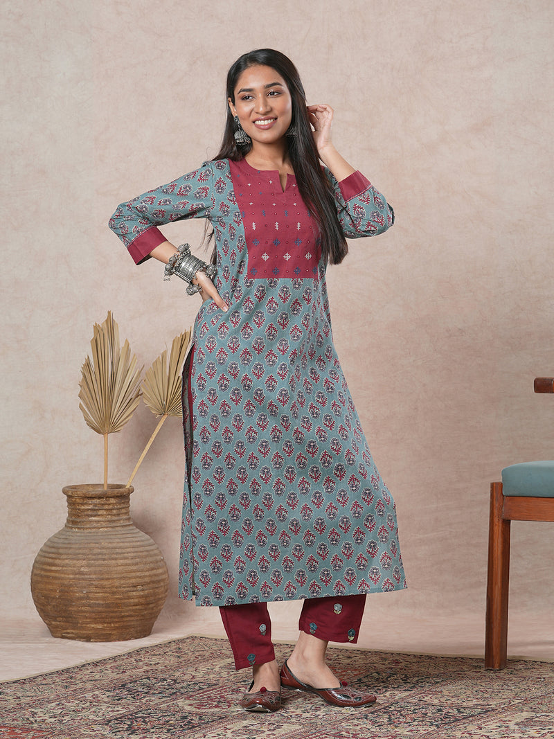 Straight cut printed kurta with a hand embroidered yoke and sleeve details.