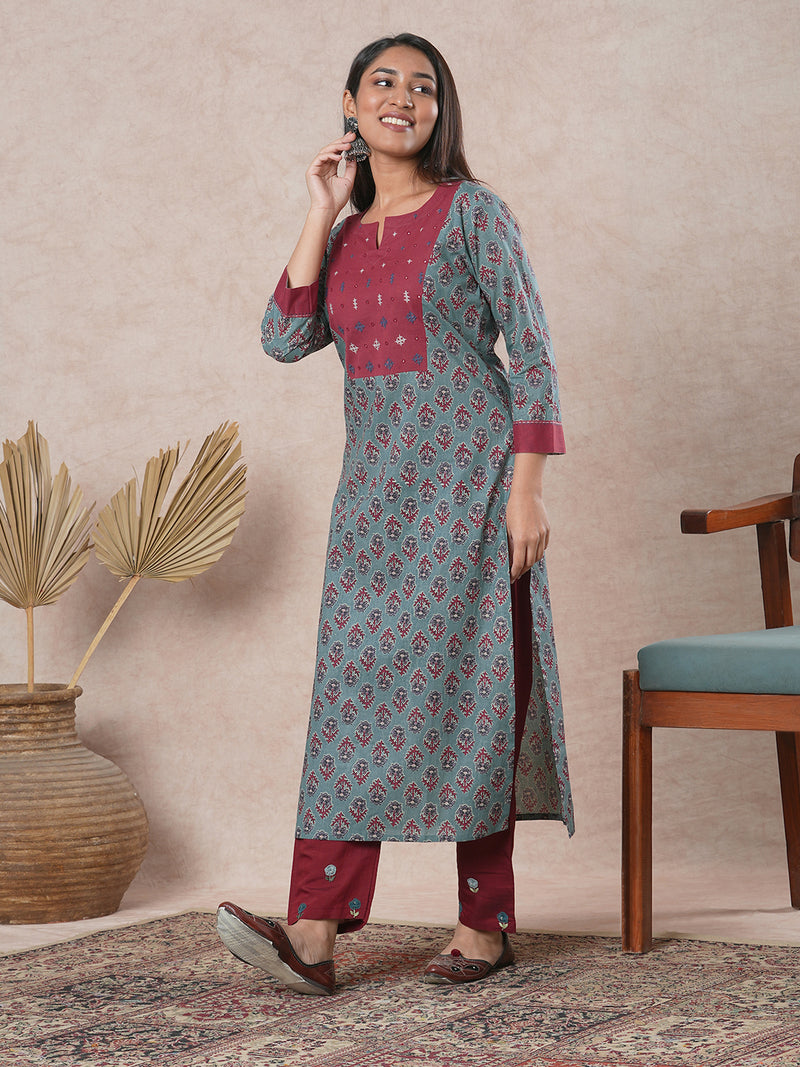 Straight cut printed kurta with a hand embroidered yoke and sleeve details.