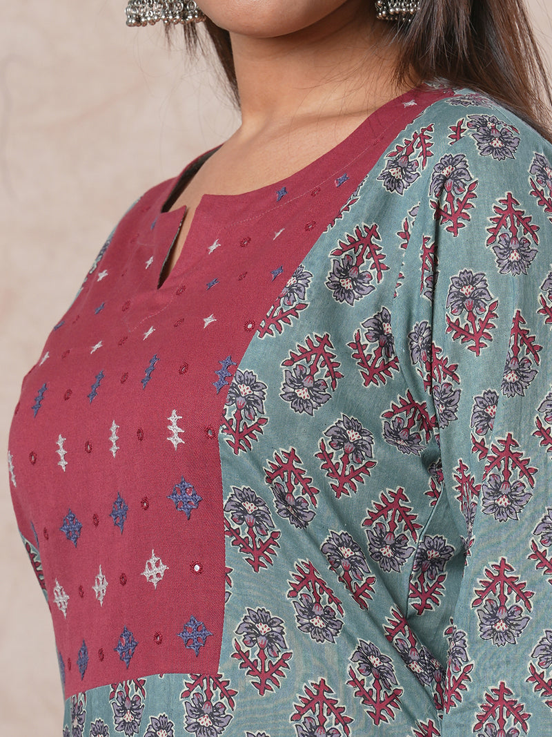 Straight cut printed kurta with a hand embroidered yoke and sleeve details.