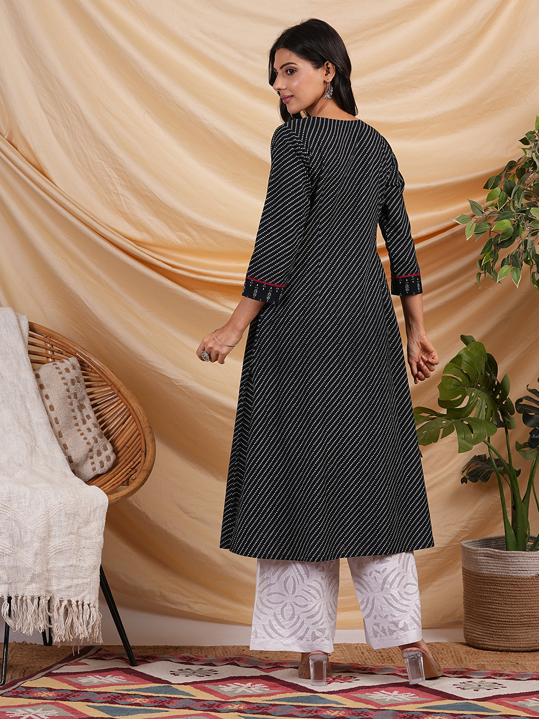 Flared Printed cotton kurta with a blend of two different prints with pleat & hand embroidery