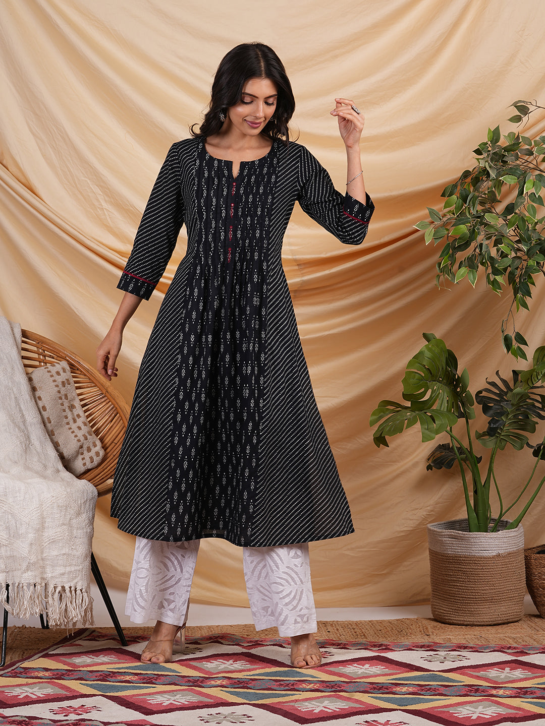 Flared Printed cotton kurta with a blend of two different prints with pleat & hand embroidery