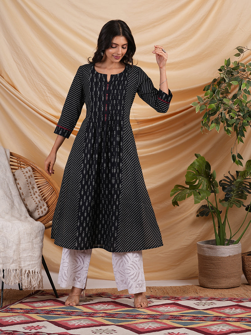 Flared Printed cotton kurta with a blend of two different prints with pleat & hand embroidery.
