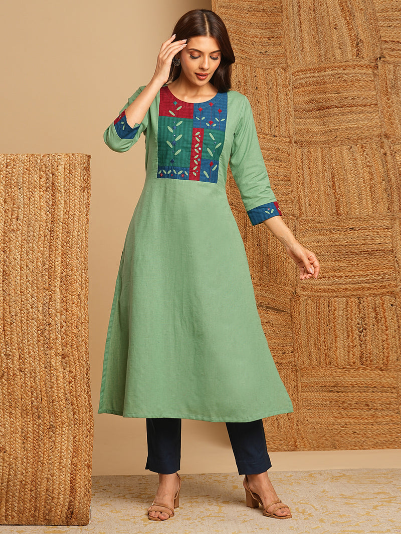 A-line kurta in cotton blend fabric with hand embroidery and applique detailing.