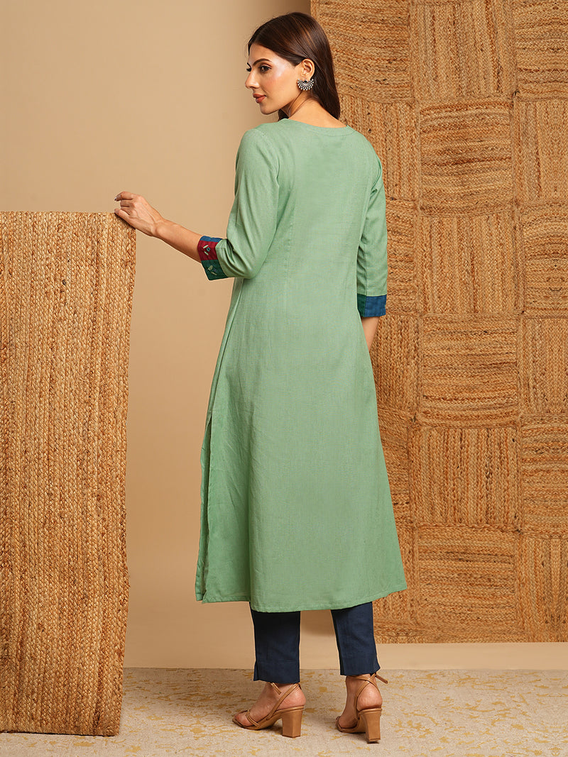 A-line kurta in cotton blend fabric with hand embroidery and applique detailing.