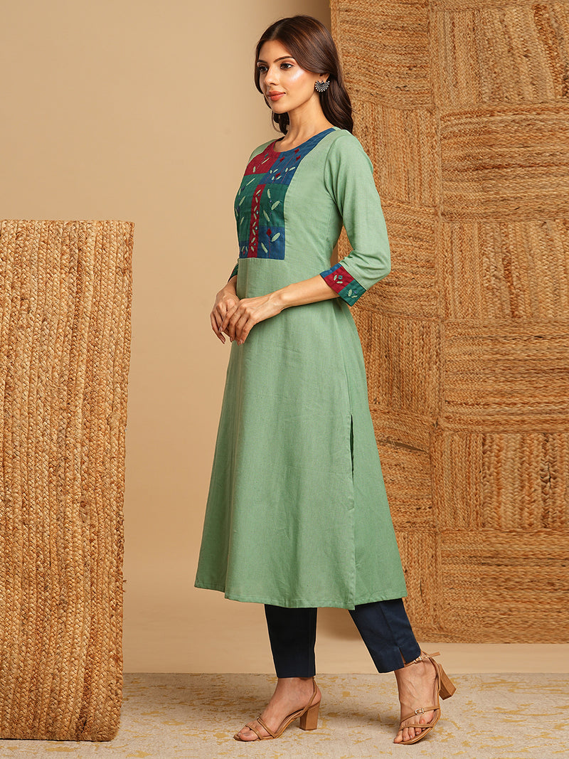 A-line kurta in cotton blend fabric with hand embroidery and applique detailing.