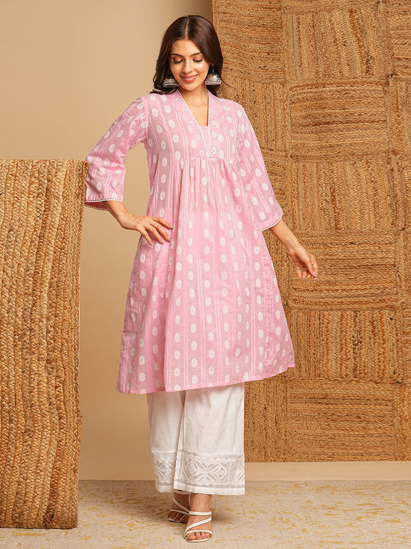 Flared kurta in woven cotton fabric with with gathering and hand embroidery.