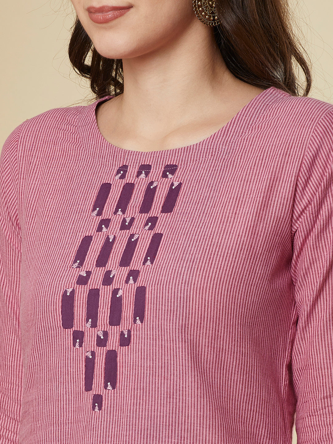 Straight cut kurta in  woven cotton fabric with hand applique and embroidery