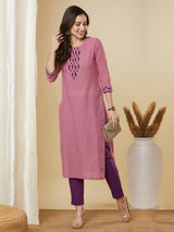 Straight cut kurta in  woven cotton fabric with hand applique and embroidery.