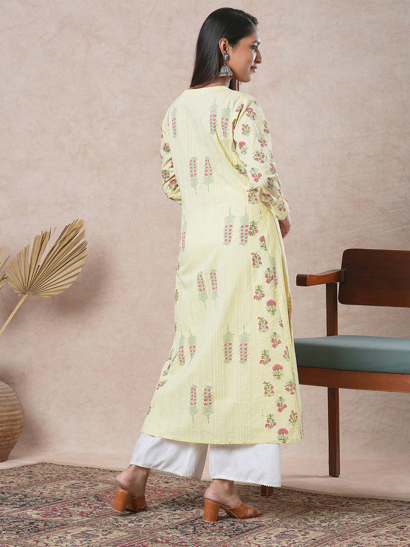 A-line cotton kurta  with embroidered neckline and blend of two different prints.