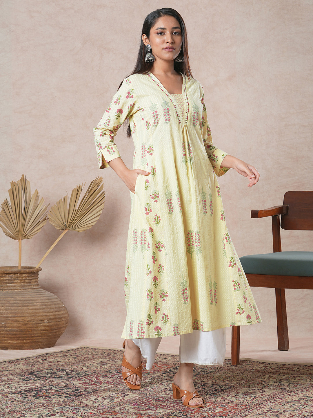 A-line cotton kurta  with embroidered neckline and blend of two different prints