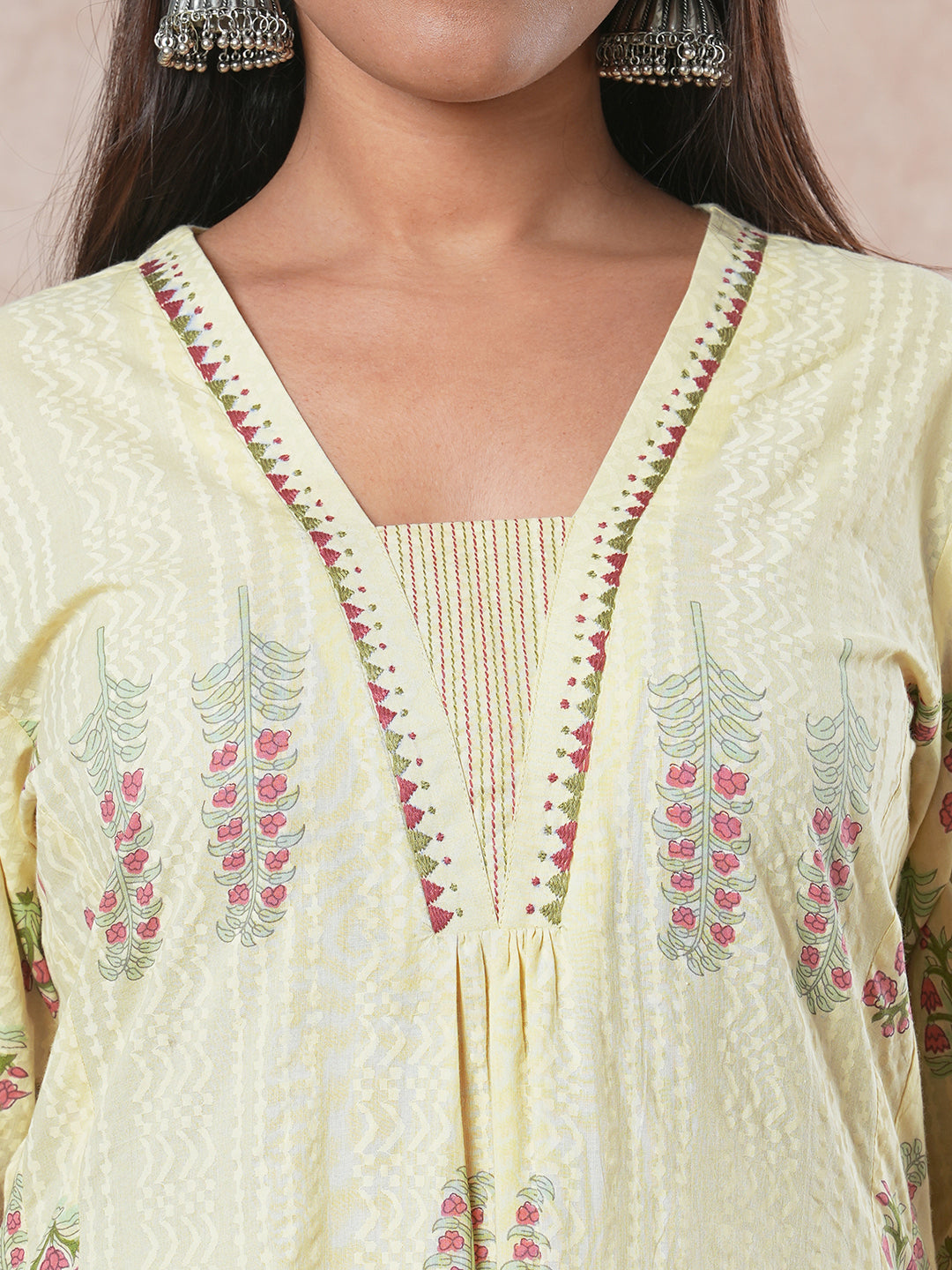 A-line cotton kurta  with embroidered neckline and blend of two different prints