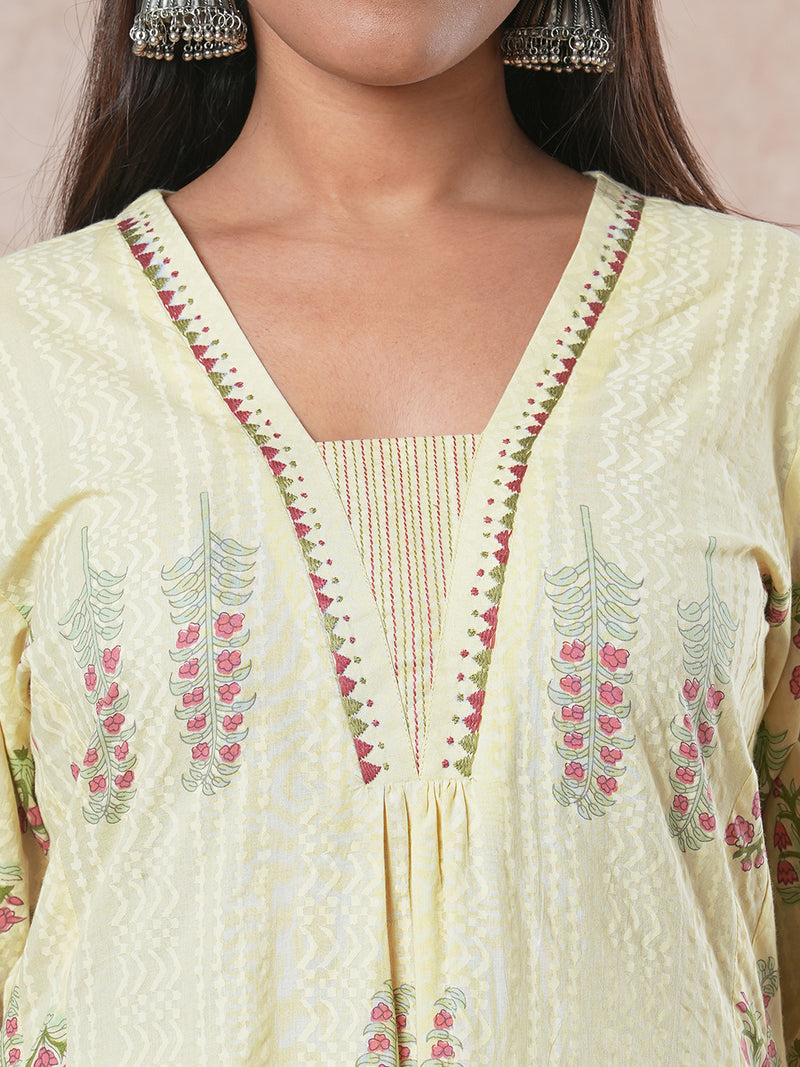 A-line cotton kurta  with embroidered neckline and blend of two different prints.