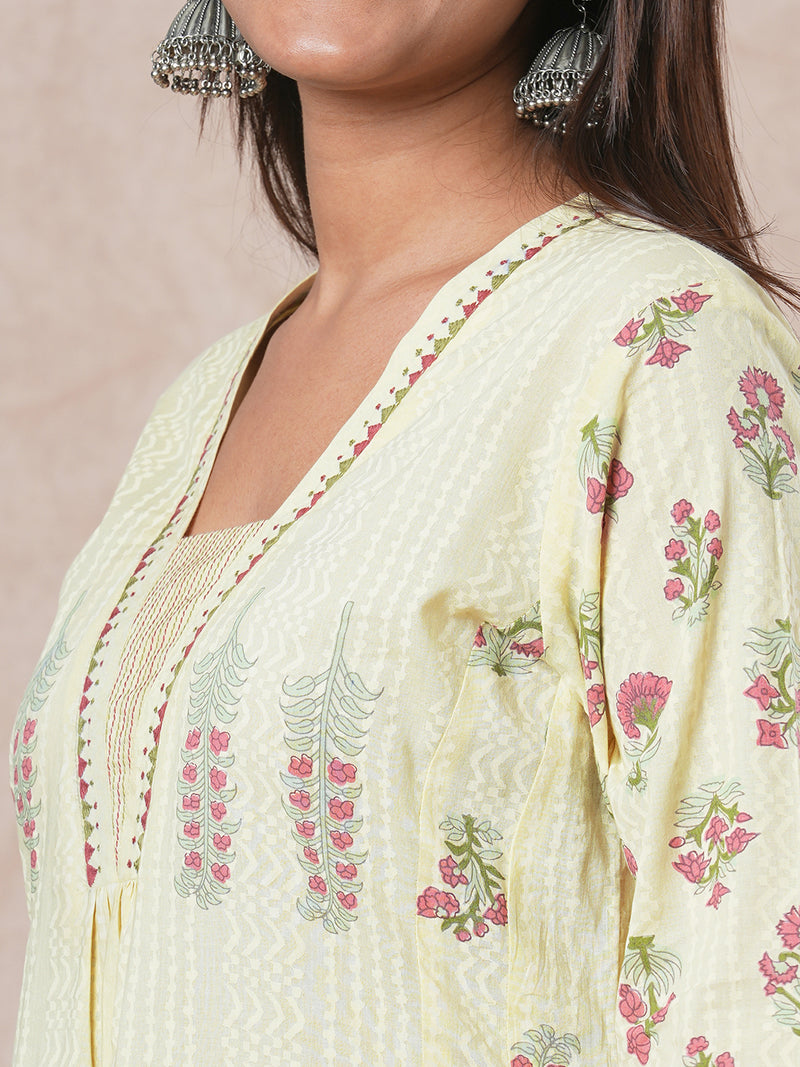 A-line cotton kurta  with embroidered neckline and blend of two different prints.