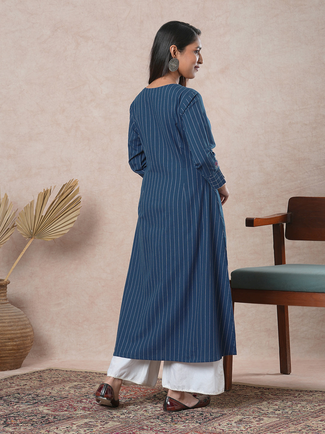 Embroidered A-line kurta with intricate beadwork and side pocket