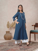 Embroidered A-line kurta with intricate beadwork and side pocket.