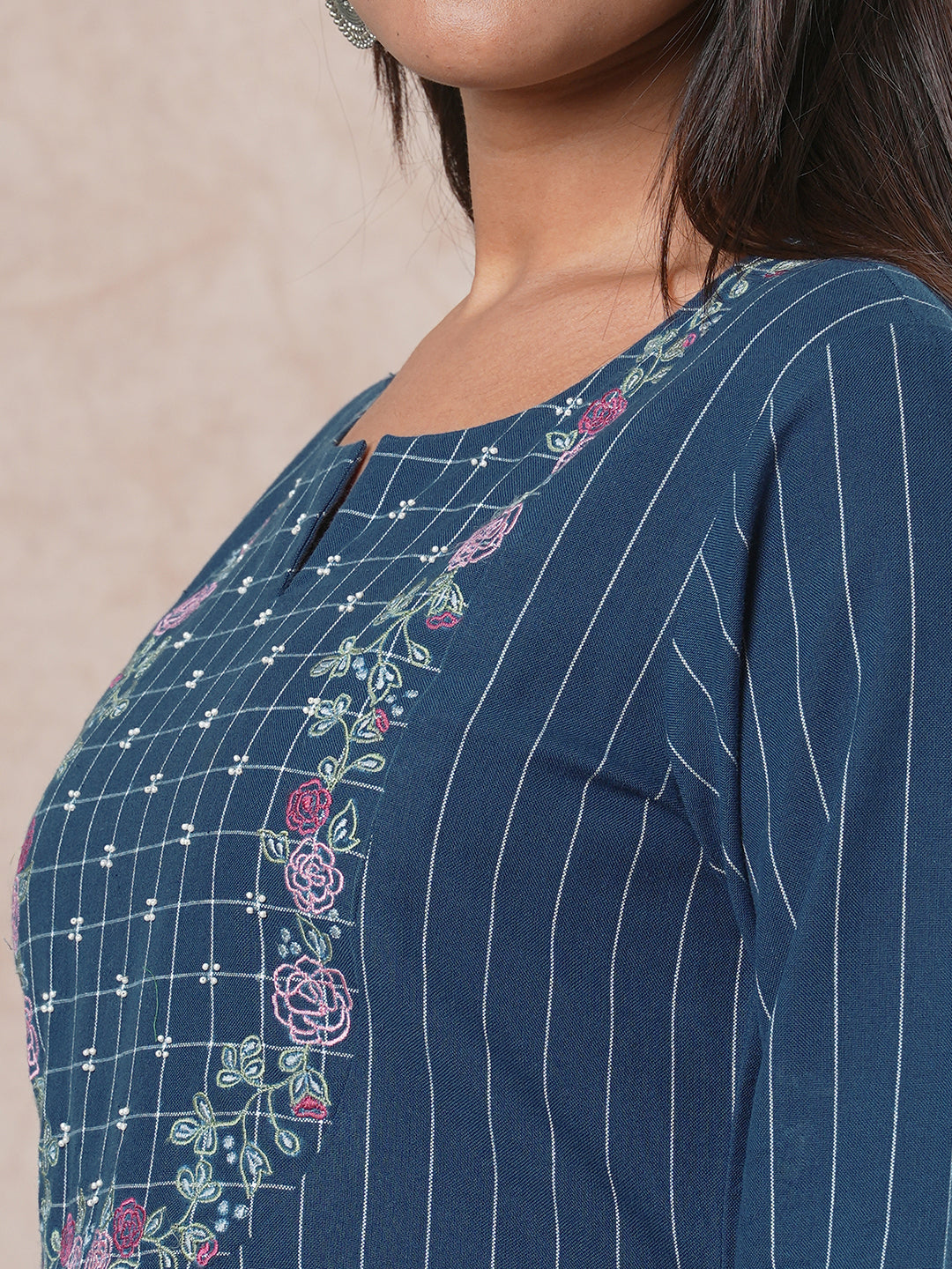 Embroidered A-line kurta with intricate beadwork and side pocket