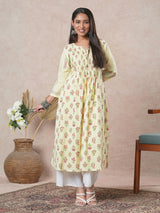 A flared cotton kurta  with embroidered neckline and blend of two different prints.