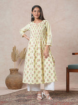 A flared cotton kurta  with embroidered neckline and blend of two different prints.