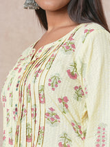 A flared cotton kurta  with embroidered neckline and blend of two different prints.