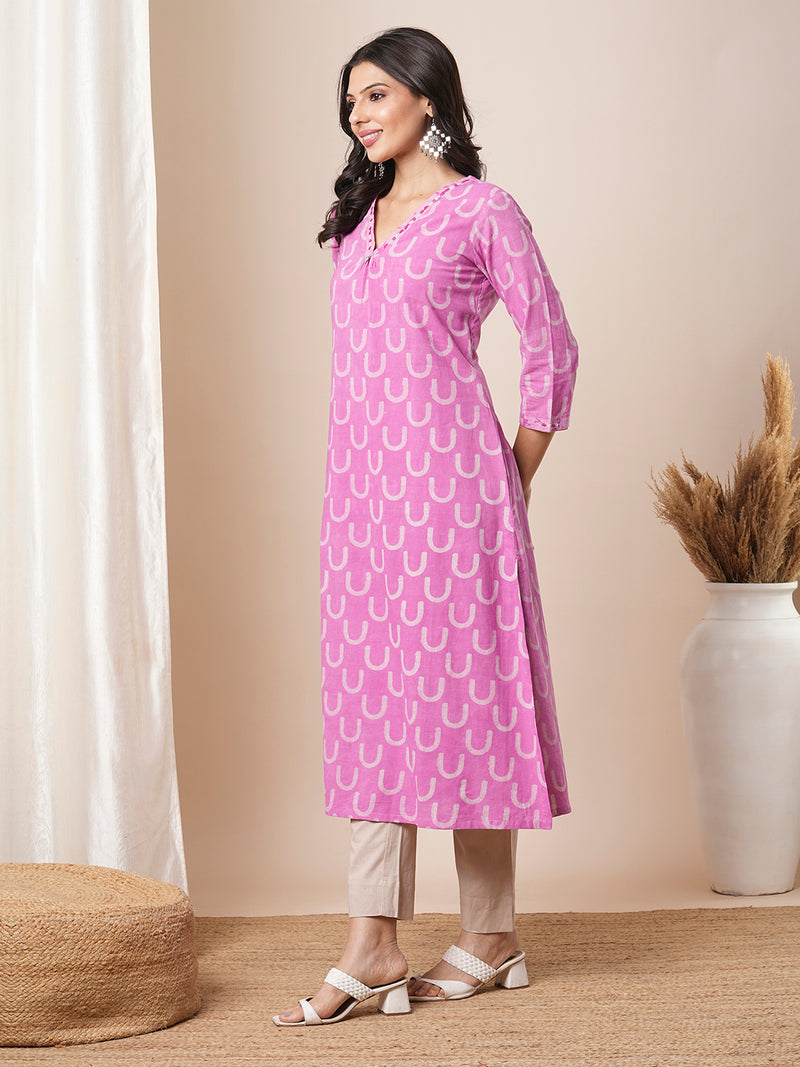 Dhabu print a line kurta with intricate hand embroidery.