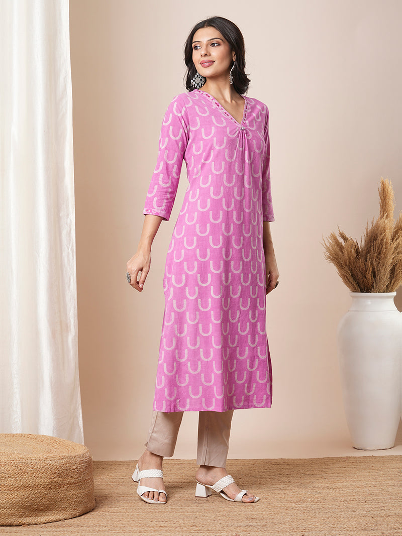 Dhabu print a line kurta with intricate hand embroidery.