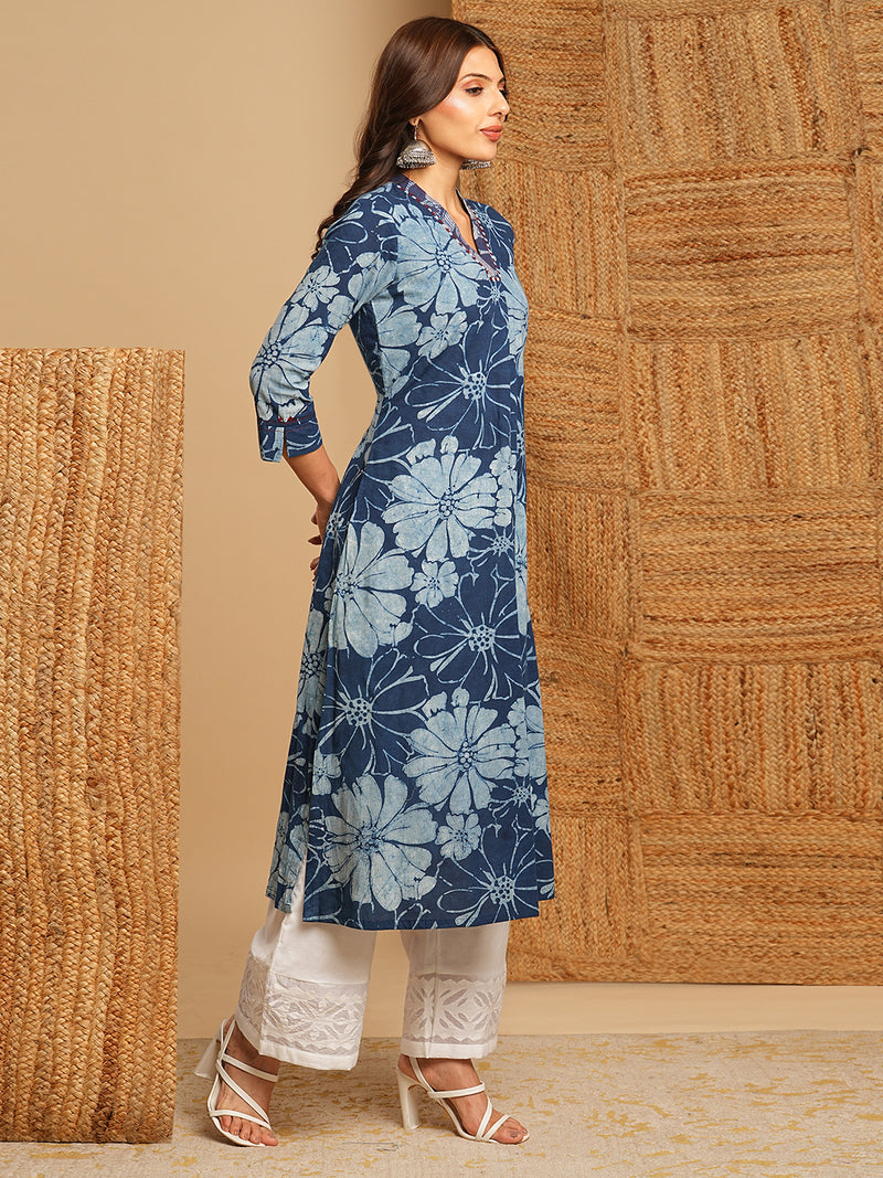 A-line kurta in dhabu print with hand embroidery detailing.