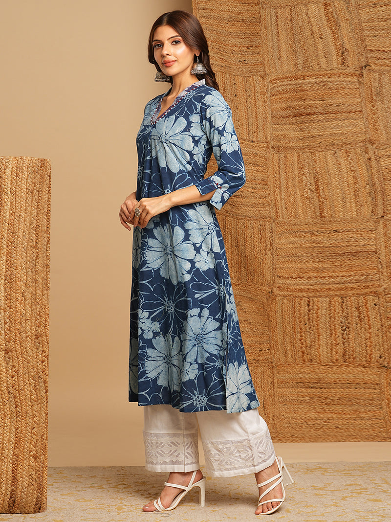 A-line kurta in dhabu print with hand embroidery detailing.