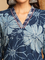 A-line kurta in dhabu print with hand embroidery detailing.