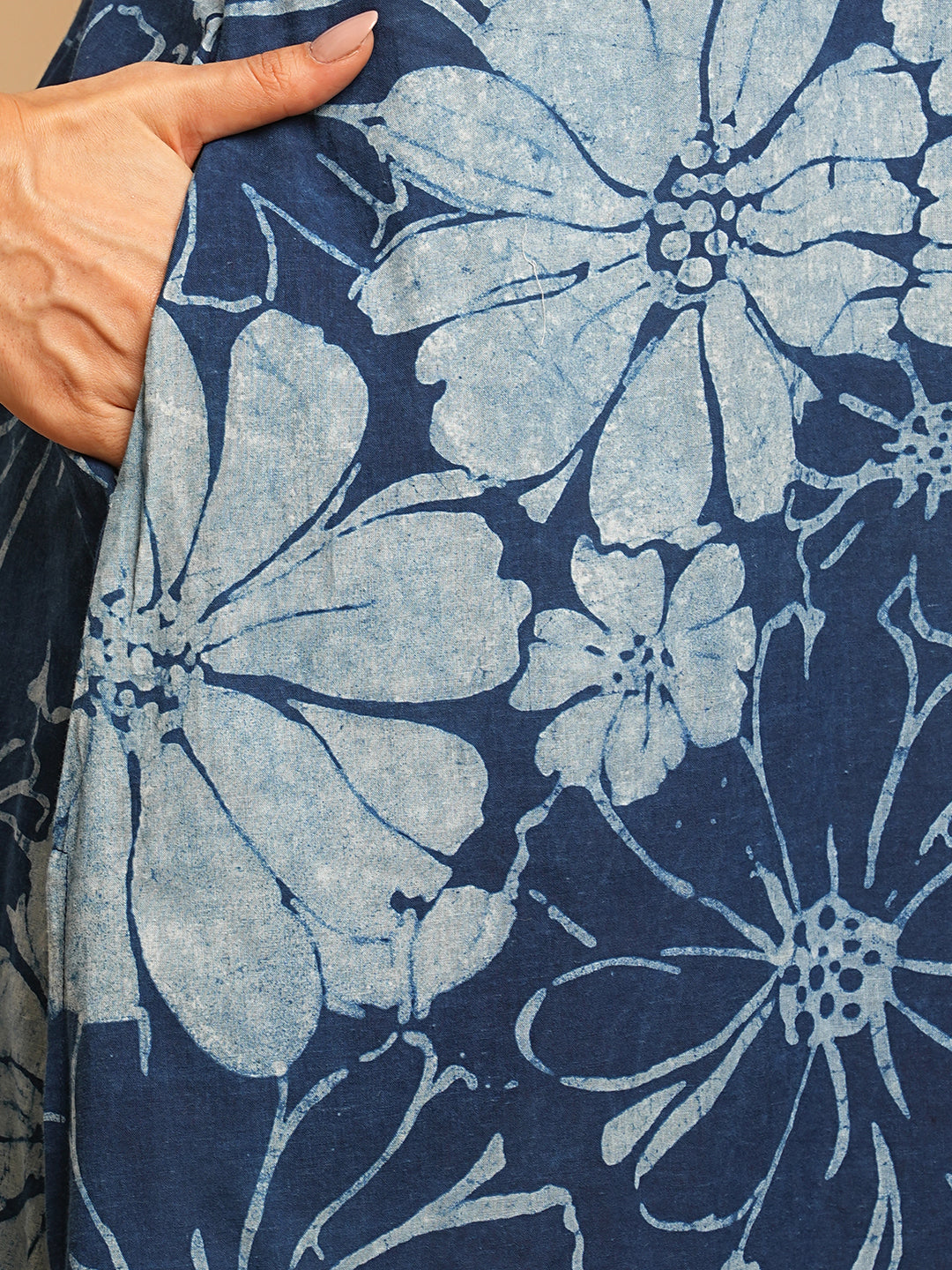 A-line kurta in dhabu print with hand embroidery detailing