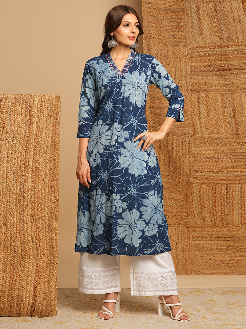 A-line kurta in dhabu print with hand embroidery detailing.