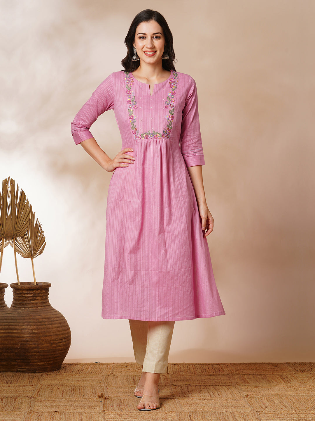 A-line kurta with beautifully embroidered yoke with beadwork detailing