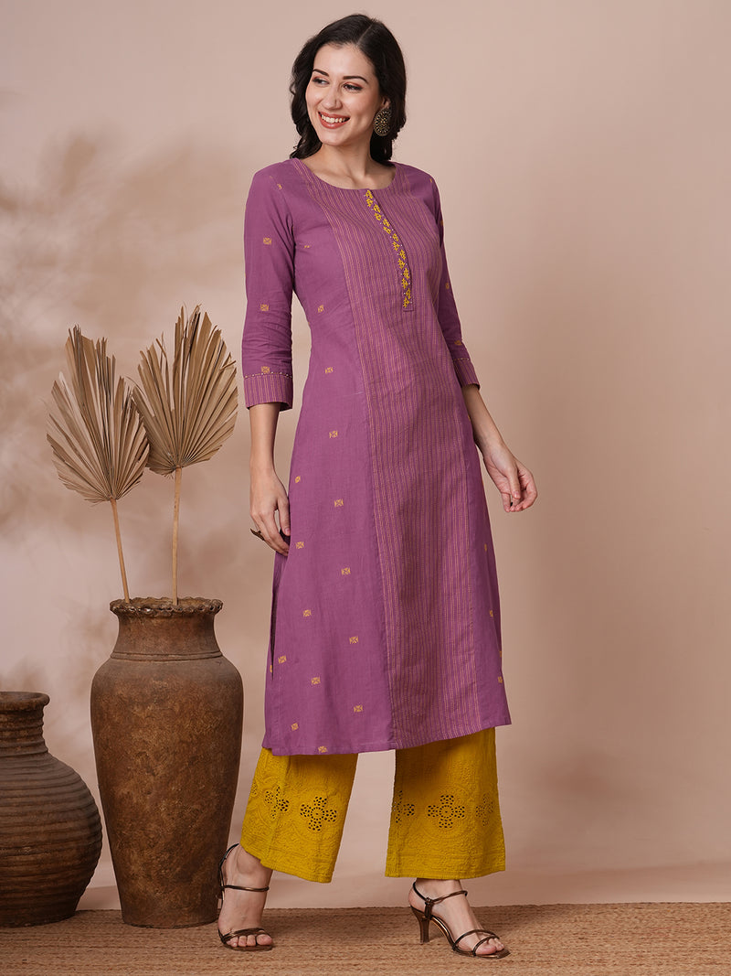 Pocketed A line kurta in cotton dobby fabric with hand embroidery.