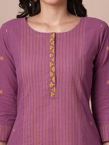 Pocketed A line kurta in cotton dobby fabric with hand embroidery.