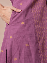 Pocketed A line kurta in cotton dobby fabric with hand embroidery.