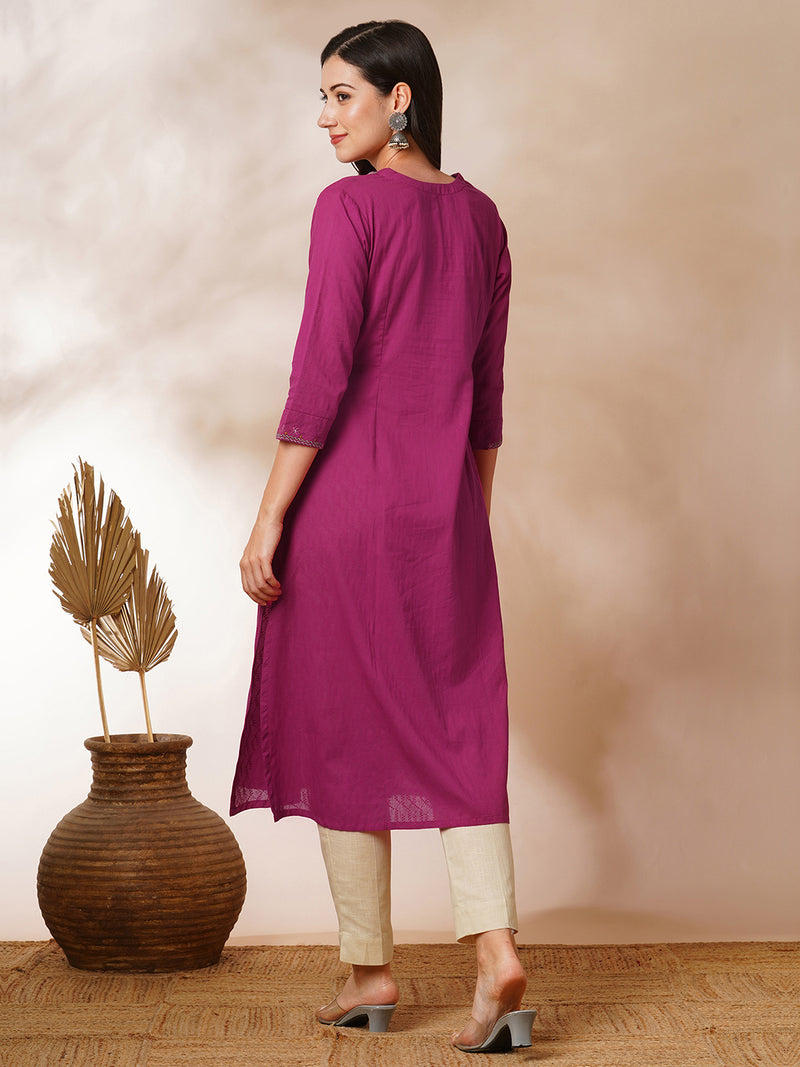 A-line woven cotton kurta with vibrant thread embroidery and gathering.