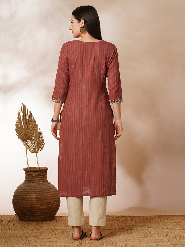 Straight kurta in striped cotton fabric with block printed yoke.